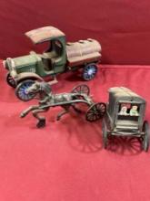 Vintage cast Iron 6" x 10" water carrier truck & 4" x 11" harnessed horse with wagon. Both have