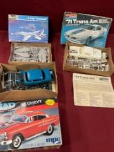 Vintage open boxes Revell F-14A Tomcat, Snap 55 Chevy, Monogram 71 trans am model kits. Unknown if