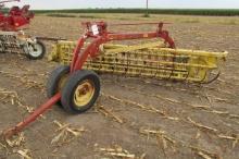 1239. NEW HOLLAND MODEL 258-9FT. PARALLEL BAR RAKE WITH HITCH WHEEL