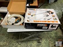 Rolling Table with Worx Hydro Shot Portable Power Cleaner