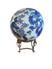 Blue and White Porcelain Globe with Dragon Design on Stand.