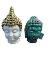 Two Green Buddha Statues with Gold Trim and Pink Tag