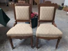 (BASE) PAIR OF ANTIQUE WOODEN CHAIRS WITH UPHOLSTERED SEATS AND BACKS, FEATURING CARVED CREST RAILS,