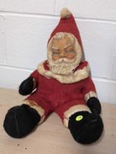 (BASE) ANTIQUE SANTA CLAUS PLUSH DOLL WITH VELVET SUIT, FAUX FUR TRIM, AND EXPRESSIVE FACE. SHOWS