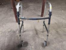 (BASE) INVACARE FOLDING HANDICAP WALKER WITH WHEELS. USED CONDITION.