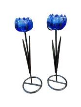 Pair of Blue Glass Flower Candle Holders on Metal Stands.