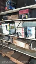 Lot on Shelves of Various Flood Lights, Security Lights, Insect Control Light, Coleman Mosquito