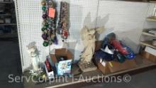 Lot on Shelf of Various Mardi Gras Beads, Shirts, Hats, Angel Statues, Metal Coke Bottles, CD's