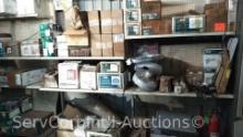 Lot on Shelves of Various Flood Lights, Light Fixtures, Emergency Lights, Light Adapter Kits, Wall