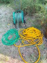 Group of Garden Hoses and Stand