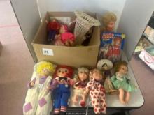 various vintage dolls