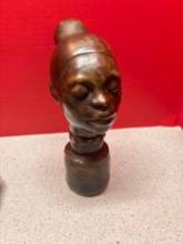 African ladies head 10 inches tall could be brass or bronze