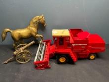 Brass horse, brass cannon, Massey Ferguson combine