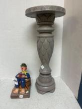 wooden carved table and clown figurine