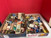 Two flats of vintage matchbooks and hotel soap bars