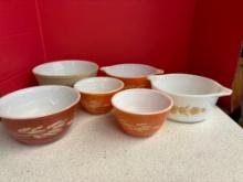 Six Pyrex bowls, various sizes and patterns