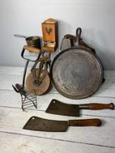 Group of Antique Meat Cleavers, Pulley, Cast Iron Griddle, Cow Bell, Match Safe, Hay Hook and More