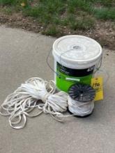 Spool of flat rope, and bucket of poly line cord