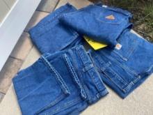 (4) pairs of dark blue jeans