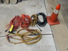 extension cords and trouble lights - jumper cables - cone