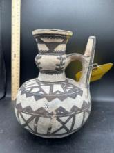 Earthen ware stylized pitcher