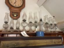 approx 10 oil lamps misc home decor cookoo clocks and more