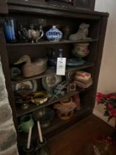 shelf full of great stuff. ceramic dog candle holders duck decoy