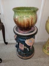 Vintage elephant plant stand with pottery planter