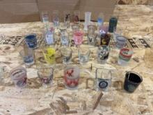 Collection Of Shot Glasses From Various Getaway Locations