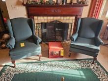 2 Green Cushioned Arm Chairs