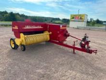 New Holland 565 square baler w/ #72 hyd swing belt thrower, SN: 817890.