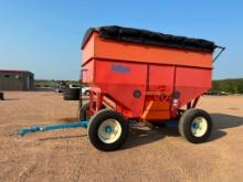 Killbros 385 gravity box on Killbros 1396 4-wheel running gear, 385/65R22.5 tires, tarp, transport