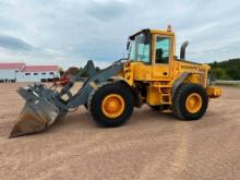 2007 Volvo L60E wheel loader, cab w/AC, 20.5x25 tires, 4-spd powershift trans, quick coupler 4 in1