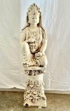 A Two-Piece Statue of a Goddess on a Decorative Stand