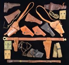 LARGE LOT OF PRIMARILY U.S. MILITARY HOLSTERS &